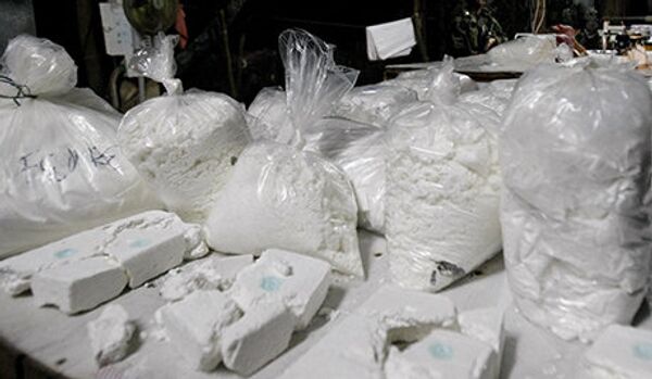 Une Russe transportant 12 kg de cocaïne a été arrêtée à l’aéroport de Hongkong - Sputnik Afrique