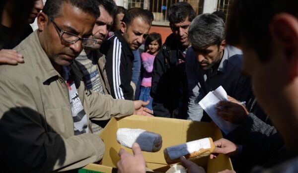 L’aide humanitaire livrée aux réfugiés palestiniens en Syrie - Sputnik Afrique