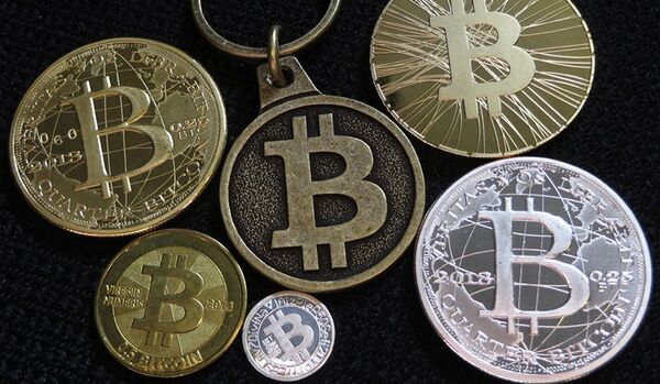 Le bitcoin pourrait générer 200 milliards USD d'économies (Goldman Sachs) - Sputnik Afrique