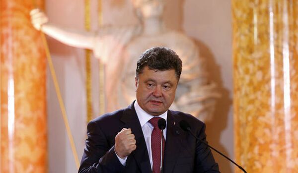 Ukraine: Poutine salue l'intention de Porochenko d'arrêter l'effusion de sang - Sputnik Afrique