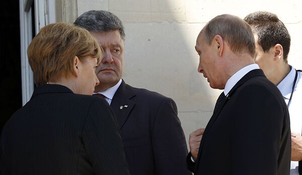 Poutine, Merkel, Hollande et Porochenko ont discuté de l’Ukraine - Sputnik Afrique