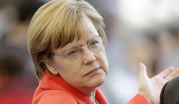 Porochenko a invité Merkel à se rendre en Ukraine - Sputnik Afrique