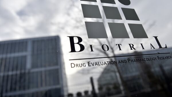 A picture taken on January 16, 2016 shows the logo of the Biotrial laboratory on its building in Rennes, western France, where a clinical trial of an oral medication left one person brain-dead and five hospitalised. - Sputnik Afrique