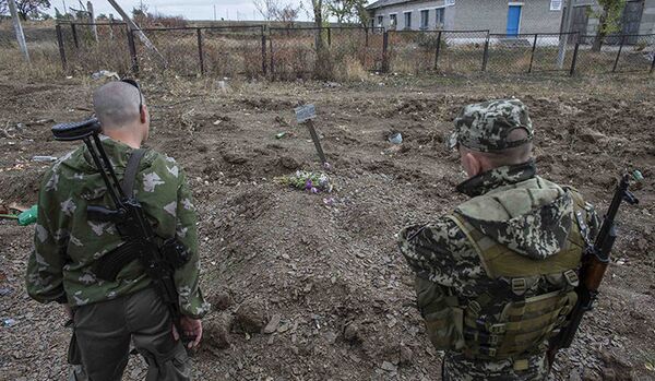 Trois charniers découverts par les observateurs de l'OSCE près de Donetsk - Sputnik Afrique