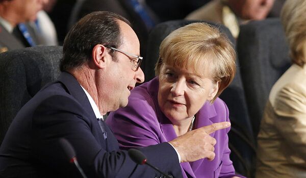 Hollande et Merkel ont discuté des progrès dans la résolution de la crise en Ukraine - Sputnik Afrique