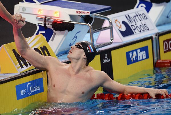 Sergey Fessikov (Russie) après le 4x50 m nage libre (Or). - Sputnik Afrique