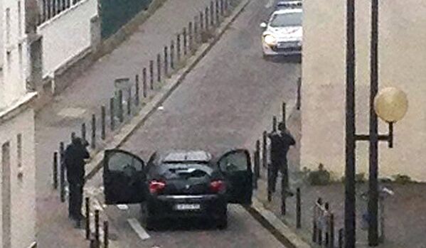 EN DIRECT. Paris: une attaque armée contre Charlie Hebdo fait 12 morts - Sputnik Afrique