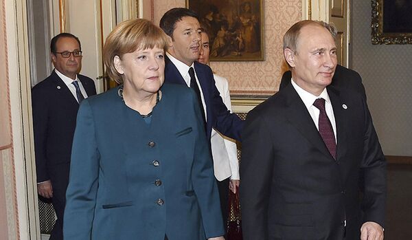 Ukraine : Poutine et Merkel réaffirment leur soutien au processus de paix - Sputnik Afrique