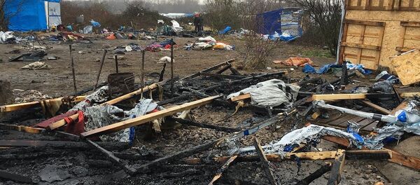 Le camp de migrants à Calais - Sputnik Afrique