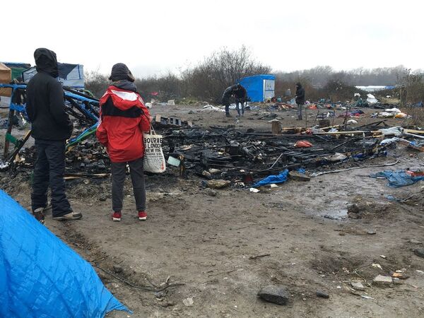 Situation dans le camp des migrants à Calais Situation dans le camp des migrants à Calais - Sputnik Afrique