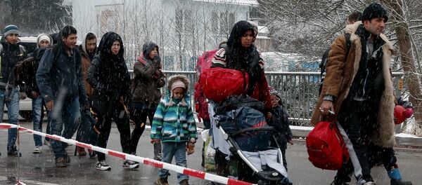 Des migrants - Sputnik Afrique