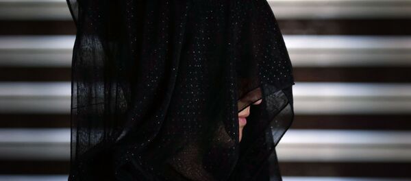 Une jeune femme yézidie Une jeune femme yézidie - Sputnik Afrique