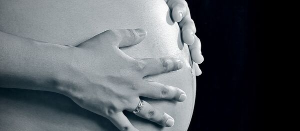 Une femme enceinte - Sputnik Afrique