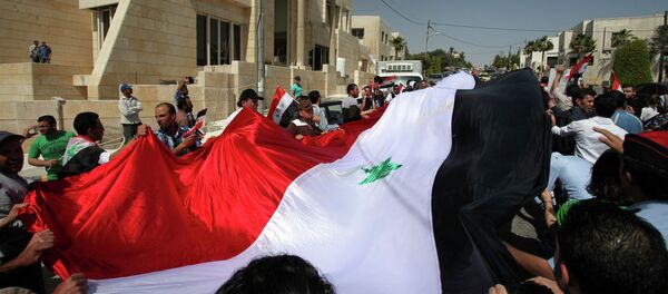 Le drapeau syrien - Sputnik Afrique
