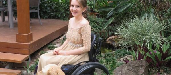 Une jeune australienne handicapée et sa chienne Lacey Une jeune australienne handicapée et sa chienne Lacey - Sputnik Afrique