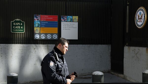 A Turkish security member stands outside a day after a suicide bomber struck the American Embassy in Turkish capital on Friday, killing a Turkish security guard in what the White House described as a terrorist attack, in Ankara, Turkey, Saturday, Feb. 2, 2013. - Sputnik Afrique