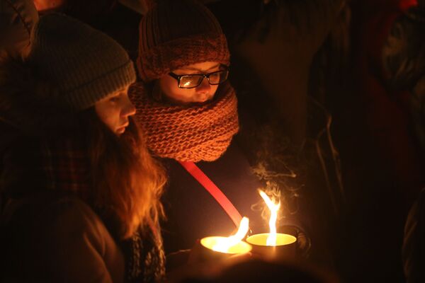 Des fleurs et des bougies en hommage aux victimes du crash de Rostov - Sputnik Afrique