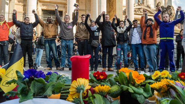 Action en hommage aux victimes des attentats de Bruxelles - Sputnik Afrique