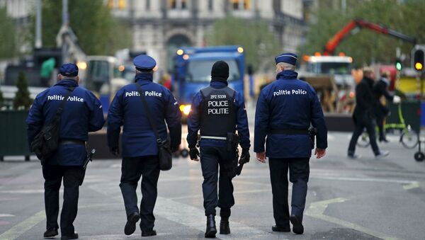 Des policiers belges en patrouille à Bruxelles après les attaques terroristes du 22 mars - Sputnik Afrique