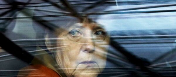 Germany's Chancellor Angela Merkel arrives at an EU-Turkey summit in Brussels, as the bloc is looking to Ankara to help it curb the influx of refugees and migrants flowing into Europe, March 7, 2016. - Sputnik Afrique