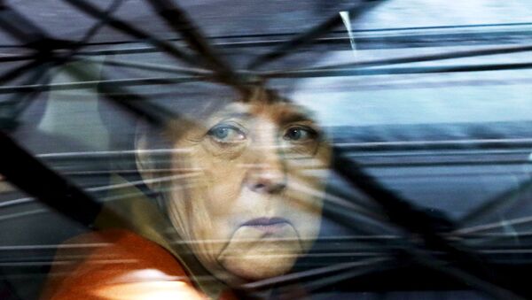 La chancelière allemande Angela Merkel arrive à un sommet UE-Turquie à Bruxelles, pour dicuter le problème des migrants, le 7 Mars 2016 - Sputnik Afrique