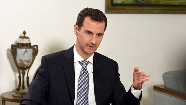 Syria's President Bashar al-Assad speaks during an interview with Spanish newspaper El Pais in Damascus, in this handout picture provided by SANA on February 20, 2016. - Sputnik Afrique