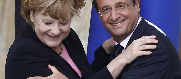 la chancelière Angela Merkel et le président français François Hollande - Sputnik Afrique