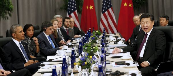 U.S. President Barack Obama (L) meets with Chinese President Xi Jinping (R) at the Nuclear Security Summit in Washington, March 31, 2016. - Sputnik Afrique