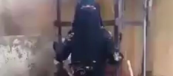 Une femme en niqab - Sputnik Afrique