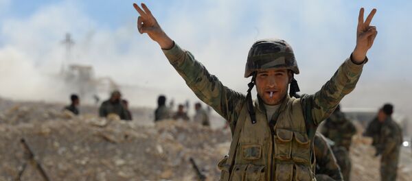 Un militaire syrien à Al-Qaryatayn - Sputnik Afrique