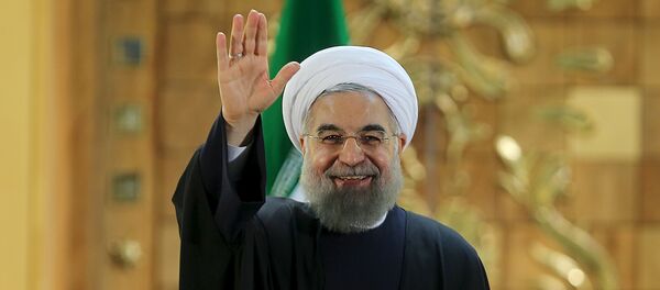 Iranian President Hassan Rouhani waves during a news conference in Tehran, Iran January 17, 2016. - Sputnik Afrique