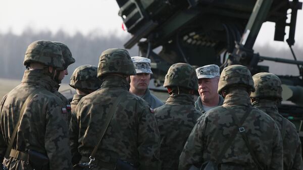 U.S. troops from 5th Battalion of the 7th Air Defense Regiment are seen at a test range in Sochaczew, Poland, on Saturday, March 21, 2015 - Sputnik Afrique