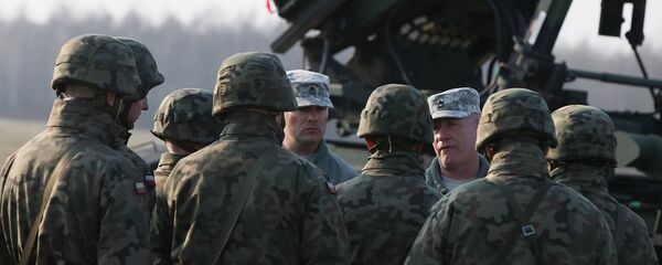 U.S. troops from 5th Battalion of the 7th Air Defense Regiment are seen at a test range in Sochaczew, Poland, on Saturday, March 21, 2015 - Sputnik Afrique