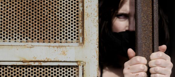 Eine Frau im Gefängnis - Sputnik Afrique