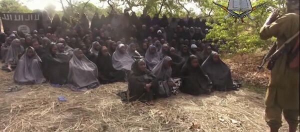 Trois ans après, 82 lycéennes nigérianes libérées par Boko Haram Trois ans après, 82 lycéennes nigérianes libérées par Boko Haram - Sputnik Afrique