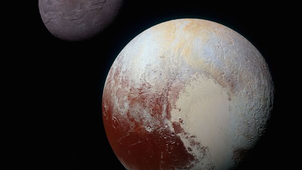 Цветные изображения Плутона его крупнейшего спутника Харона - Sputnik Afrique