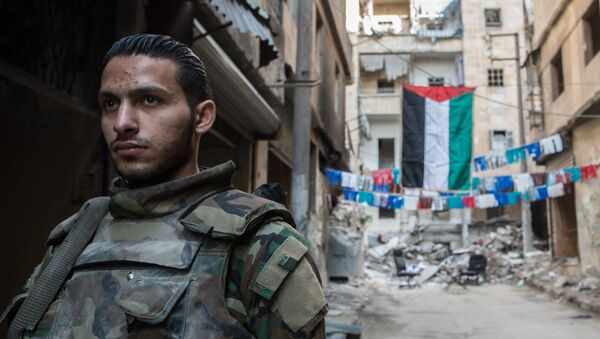 Un soldat de l'armée syrienne à Alep - Sputnik Afrique