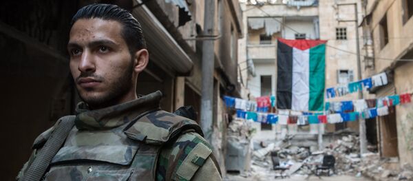 Un soldat de l'armée syrienne à Alep - Sputnik Afrique