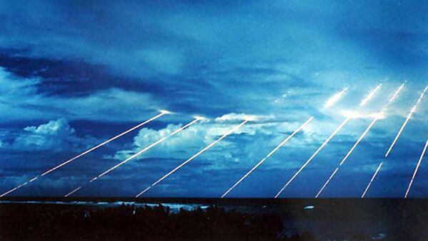 An undated recent US Army file picture shows US Peacekeeper (MX) missile tests streaking across the sky enroute to targets in and around Kwajalein Atoll, in the Marshall Islands. - Sputnik Afrique