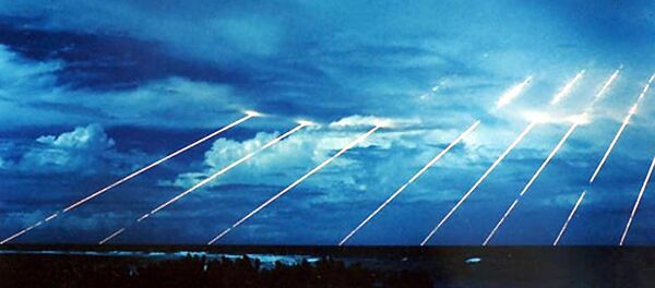 An undated recent US Army file picture shows US Peacekeeper (MX) missile tests streaking across the sky enroute to targets in and around Kwajalein Atoll, in the Marshall Islands. - Sputnik Afrique