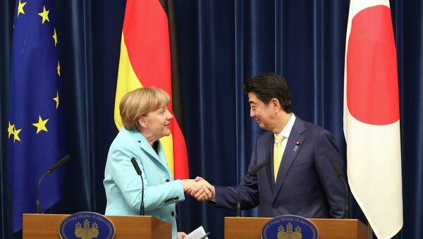 Angela Merkel et Shinzo Abe - Sputnik Afrique