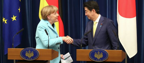 Angela Merkel et Shinzo Abe - Sputnik Afrique