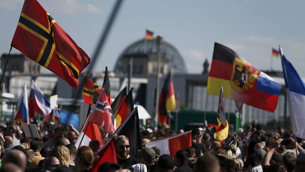 Des milliers de manifestants anti-Merkel à Berlin - Sputnik Afrique