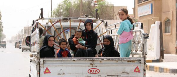 Une famille syrienne, image d'illustration - Sputnik Afrique