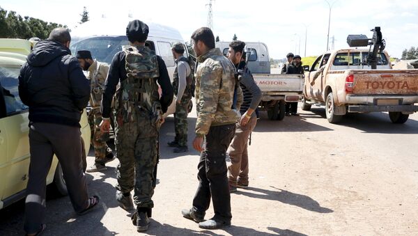 Des combattants du Front al-Nosra près de la ville syrienne d'Idlib - Sputnik Afrique
