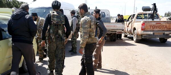 Des combattants du Front al-Nosra près de la ville syrienne d'Idlib - Sputnik Afrique