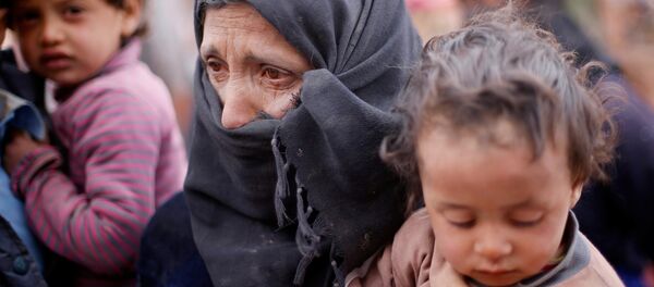 Les terroristes bloquent les civils dans l'est d'Alep, privés d'aide humanitaire Les terroristes bloquent les civils dans l'est d'Alep, privés d'aide humanitaire - Sputnik Afrique