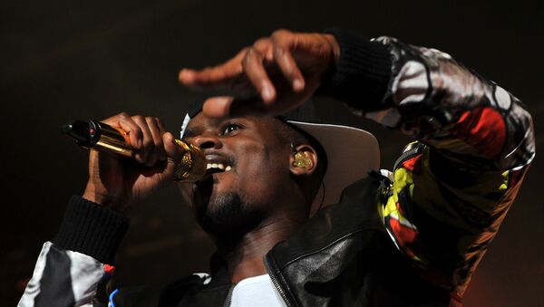 French-Guinean rapper Alpha Diallo, aka Black M, performs at the 39th edition of Le Printemps de Bourges rock and pop music festival in Bourges on April 28, 2015. - Sputnik Afrique