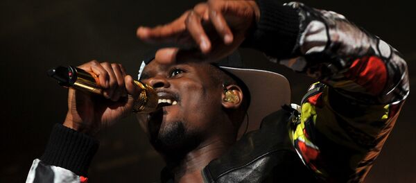 French-Guinean rapper Alpha Diallo, aka Black M, performs at the 39th edition of Le Printemps de Bourges rock and pop music festival in Bourges on April 28, 2015. French-Guinean rapper Alpha Diallo, aka Black M, performs at the 39th edition of Le Printemps de Bourges rock and pop music festival in Bourges on April 28, 2015. - Sputnik Afrique