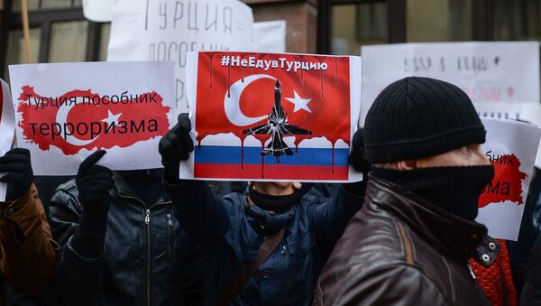 Акция протеста в Москве против действий ВВС Турции - Sputnik Afrique